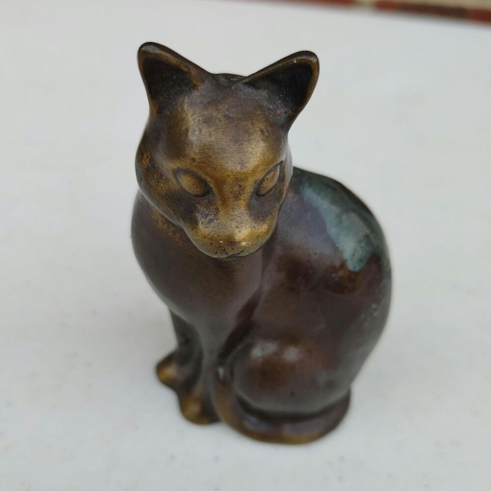 Bronze sculpture casting of a CAT by Scott Nelles